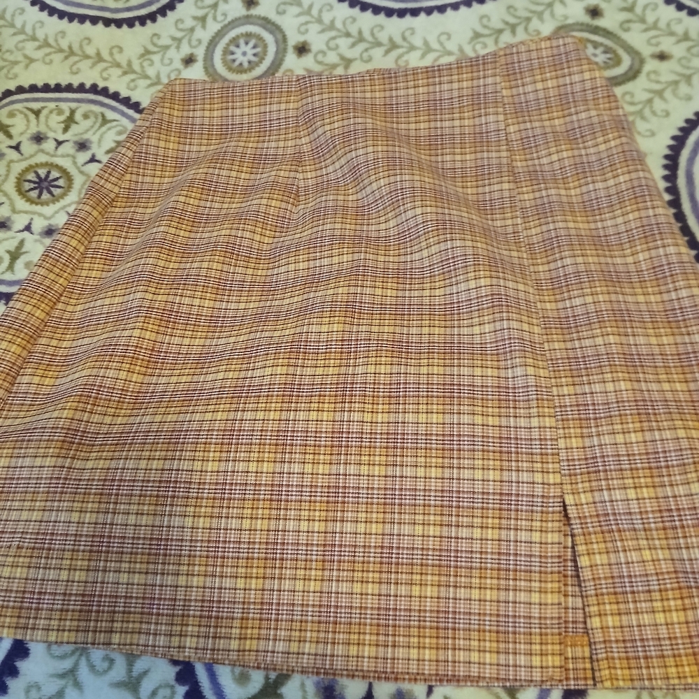 3 Skirt Bundle. 2 Elegant Black Women's Skirt.and Orange Plaid Skirt.